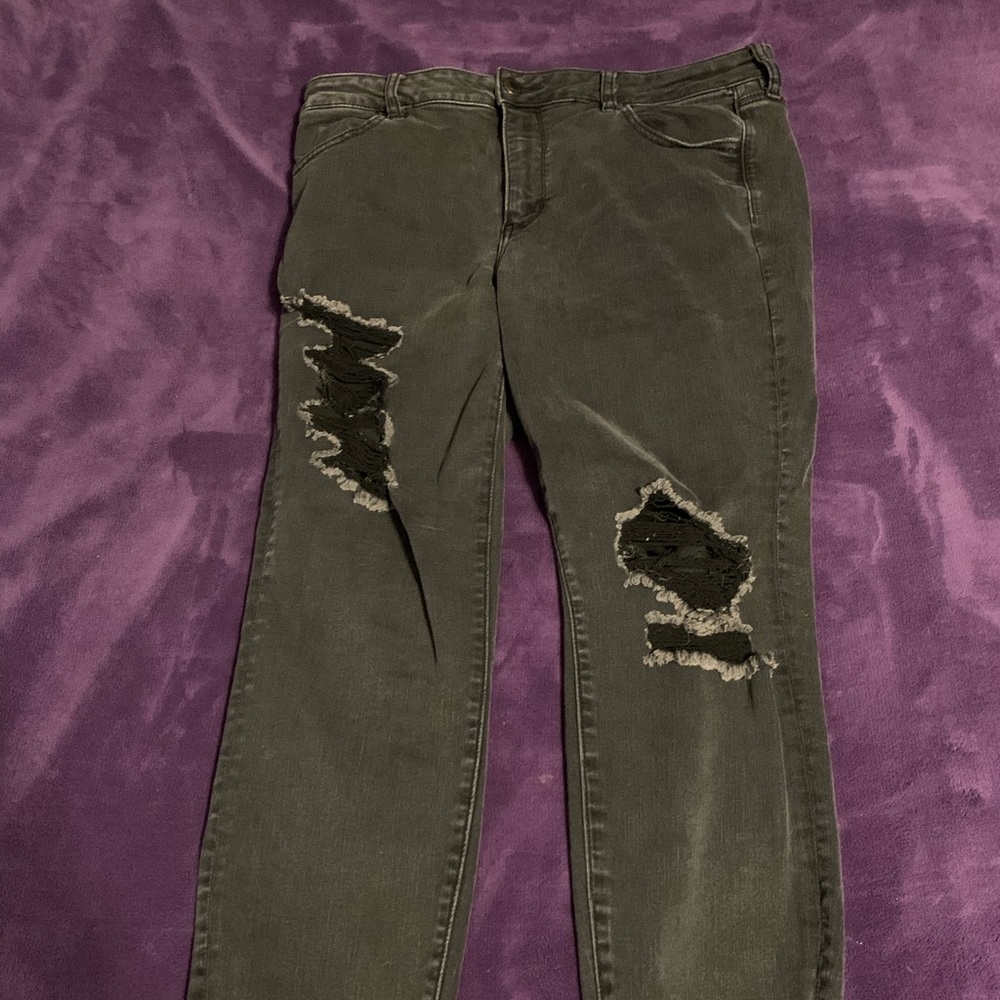 Faded Black American Eagle ripped jeggings. Size 16 short length.